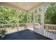 Inviting sunroom with wooded views, offering a peaceful space for relaxation and outdoor enjoyment at 6512 Blalock Forest Dr, Willow Springs, NC 27592
