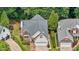 Aerial view of home shows roof detail, landscaping, and a brick walkway at 6728 Pointe Vista Cir, Raleigh, NC 27615