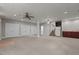 Spacious finished basement with carpet, recessed lighting, and a wet bar area at 6728 Pointe Vista Cir, Raleigh, NC 27615