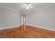 Spacious bedroom with hardwood flooring and ample natural light at 6728 Pointe Vista Cir, Raleigh, NC 27615