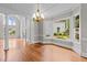 Open living area with large windows, hardwood flooring, and lots of natural light at 6728 Pointe Vista Cir, Raleigh, NC 27615
