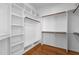 Walk-in closet with shelving at 6728 Pointe Vista Cir, Raleigh, NC 27615