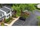Aerial view of community featuring well-maintained townhomes and convenient parking at 7719 Kingsberry Ct, Raleigh, NC 27615