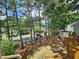 Relaxing backyard with great trees and lovely community views at 7719 Kingsberry Ct, Raleigh, NC 27615