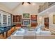 Inviting living room with built-in cabinets, fireplace, and elegant decor at 8 Pine Top Pl, Durham, NC 27705