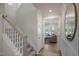 Welcoming hallway with stairs leading to a bright living space at 89 Merle Way, Wendell, NC 27591