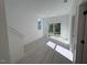 Entryway with sliding door to backyard and light wood floors at 1003 Regalia Rd # 33, Durham, NC 27713