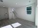 Bright entryway with stairway and light wood floors at 1003 Regalia Rd # 33, Durham, NC 27713