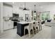 Modern kitchen features a breakfast bar and stainless steel appliances at 1003 Regalia Rd # 33, Durham, NC 27713