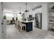 Open kitchen layout features a breakfast bar and modern appliances at 1003 Regalia Rd # 33, Durham, NC 27713