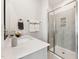 This bathroom has a glass shower with a tiled seat and a quartz countertop at 101 Ailey Brook Way # 200, Wake Forest, NC 27587