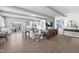 Spacious open-concept living room with luxury vinyl flooring, neutral paint colors, and modern furnishings at 101 Ailey Brook Way # 200, Wake Forest, NC 27587