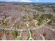 Overhead view of the the neighborhood and surrounding woods at 10210 Governors Drive Dr, Chapel Hill, NC 27517