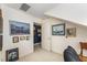 Attic room with nautical artwork and access to another room at 10210 Governors Drive Dr, Chapel Hill, NC 27517