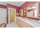 Elegant bathroom with double vanity, granite countertops, and stylish fixtures at 10210 Governors Drive Dr, Chapel Hill, NC 27517