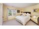 Charming bedroom with a large window, comfortable bed, and stylish furniture at 10210 Governors Drive Dr, Chapel Hill, NC 27517