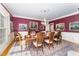 Formal dining room with elegant table setting and chandelier at 10210 Governors Drive Dr, Chapel Hill, NC 27517