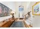 Inviting foyer with hardwood floors, high ceilings, staircase, and elegant decor at 10210 Governors Drive Dr, Chapel Hill, NC 27517