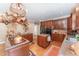 Gourmet kitchen with custom cabinets, granite countertops, hardwood floors and a copper pot rack at 10210 Governors Drive Dr, Chapel Hill, NC 27517