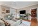 Comfortable living room with a TV, decor, and access to other rooms at 10210 Governors Drive Dr, Chapel Hill, NC 27517