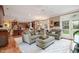 Comfortable living room features an open floor plan, bright windows, and cozy seating at 10210 Governors Drive Dr, Chapel Hill, NC 27517