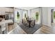Elegant dining area with modern lighting and large windows providing ample natural light at 103 Ailey Brook Way # 200, Wake Forest, NC 27587