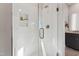 Modern shower with white subway tile, a built-in niche, glass enclosure, and sleek fixtures at 105 Ailey Brook Way # 200, Wake Forest, NC 27587