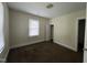 Bedroom featuring carpeted floors, and a window that provides natural light at 1202 Kilby St, Burlington, NC 27215