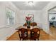 Bright dining room featuring hardwood floors and classic furnishings at 1304 N Duke St, Durham, NC 27701