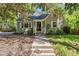 Inviting single-story home with landscaped front yard, classic brick exterior, and welcoming entrance at 1304 N Duke St, Durham, NC 27701