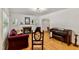 Cozy living room featuring a fireplace, hardwood floors, and plenty of natural light at 1304 N Duke St, Durham, NC 27701