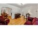 Spacious living room featuring hardwood floors, an archway, and classic decor at 1304 N Duke St, Durham, NC 27701