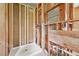 Bathroom in progress featuring exposed studs and new shower base, perfect for custom renovation at 1407 Arnette Ave, Durham, NC 27707