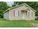 Charming single-story home featuring a cozy front porch and traditional siding at 1416 Betz St, Rocky Mount, NC 27803