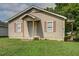 Charming single-story home featuring a cozy front porch and traditional siding at 1416 Betz St, Rocky Mount, NC 27803