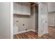 Dedicated laundry room with overhead storage and available hookups at 1416 Betz St, Rocky Mount, NC 27803