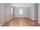 A living room featuring luxury vinyl plank flooring and neutral-toned paint at 1416 Betz St, Rocky Mount, NC 27803