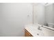 Well-lit half bathroom with a modern sink, mirror, and neutral wall color at 1601 Balkan Rd, Fuquay Varina, NC 27526