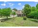 Charming home with dormer windows, attached garage, and well-manicured lawn at 1601 Balkan Rd, Fuquay Varina, NC 27526