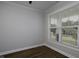 This bedroom offers natural light and neutral paint, showcasing the modern flooring at 170 Kinsale Ct, Garner, NC 27529