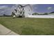 Charming two-story home with a well-manicured lawn and a white picket fence at 170 Kinsale Ct, Garner, NC 27529
