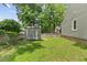 Well-maintained backyard with lush lawn and storage shed at 1801 Sagamore Ct, Raleigh, NC 27604