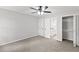 Bedroom view with carpet, two doors and a wardrobe with shelves at 1801 Sagamore Ct, Raleigh, NC 27604