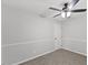 Spare bedroom with a ceiling fan, carpeted floors, and ample space at 1801 Sagamore Ct, Raleigh, NC 27604