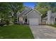 Charming single-Gathering home with a well-manicured lawn and attached single car garage at 1801 Sagamore Ct, Raleigh, NC 27604