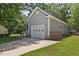Rear exterior showcasing the home's architectural style and well-kept surroundings at 1801 Sagamore Ct, Raleigh, NC 27604
