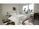 Bright bedroom showcasing a comfortable bed, stylish decor, and ample natural light at 1804 Pershing Rd, Raleigh, NC 27608