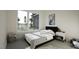 Charming bedroom with a patterned rug, bright window and playful decor at 1804 Pershing Rd, Raleigh, NC 27608