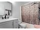 Bathroom features a shower-tub combination, white toilet, and a modern vanity at 2 Capri Ter, Durham, NC 27703