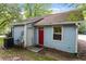 Home exterior with siding, windows, and a red front door at 2 Capri Ter, Durham, NC 27703